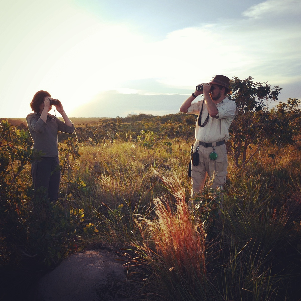 Bianca and Giuliano birding at sunset in the Cerrado. Noah Strycker
