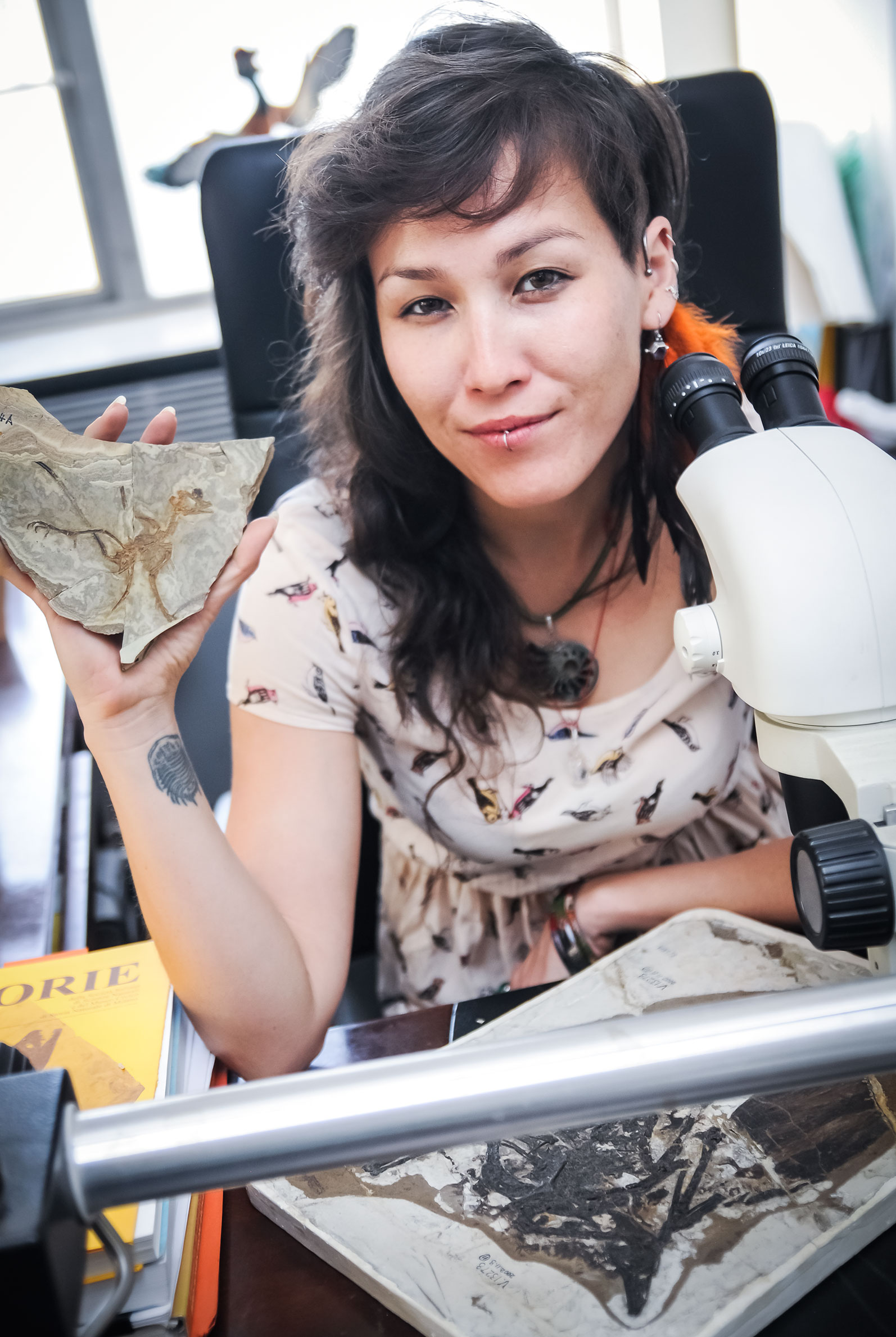 Jingmai O'Connor, a coauthor of the new study, in her lab with a fossil bird. Jingmai O'Connor/Chinese Academy of Sciences
