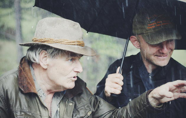 Peter and Noah watch a family of Great Gray Owls in central Oregon. Bob Keefer
