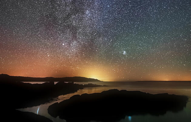 Light pollution from Grand Manan Island and other developed areas in the Northeast competes with the grandeur of the Milky Way, as seen from the Bog Brook Preserve area on Maine’s Bold Coast. Mike Taylor
