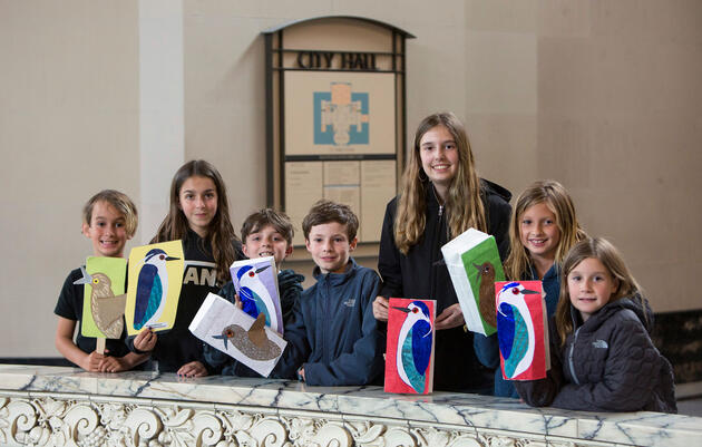 Students from Park Day School, with Black-Crowned Night-Heron puppets portraying the bird at various life stages, at City Hall for an Oakland City Council meeting to confirm the night-heron as the official city bird. Alison Yin