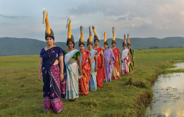 Purnima Barman (front) and women in Assam, India, sang traditional songs, adapted with stork lyrics, and danced in headdresses at a recent baby shower. Smita Sharma