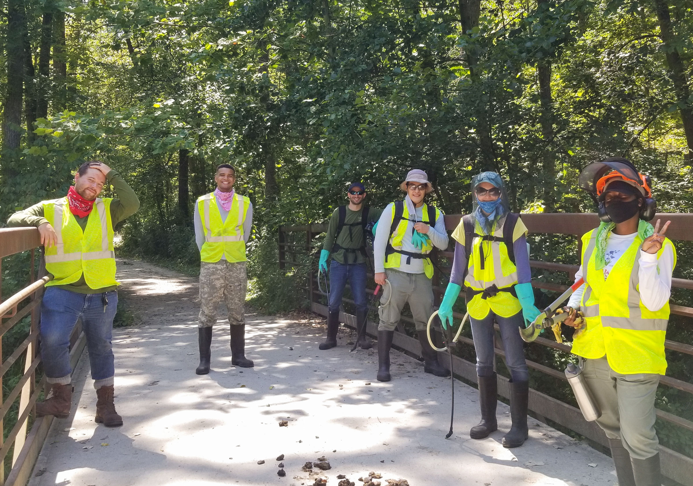 Audubon interns, from left, Seth Davis, Adam Gluekert, Andrew Grossman, Servando Moreno, Alyssa Wendt, and Rachel Patterson pose for a photo after a workday at McClaughery Springs southwest of Chicago. Diana Krug/Forest Preserves of Cook County
