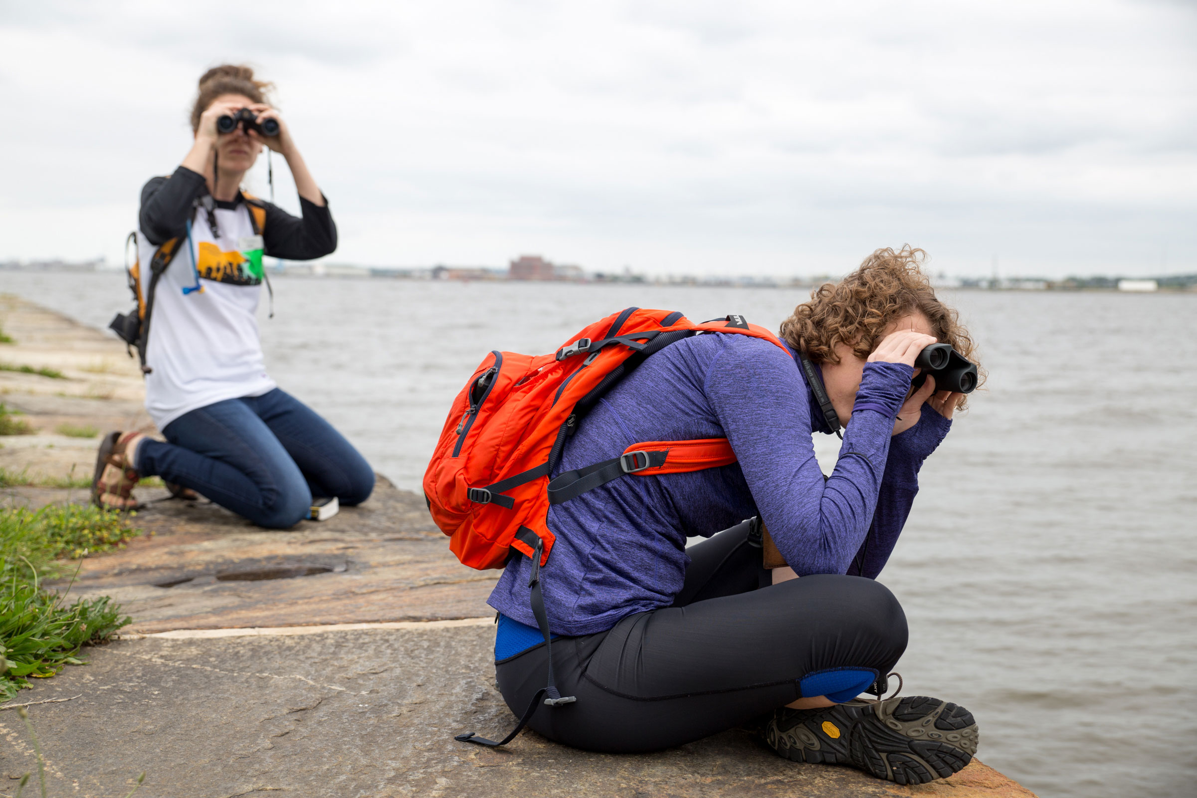 Birders scan the waters off of Fort McHenry National Monument and Historic Shrine during Audubon's Baltimore Birding Weekend. Camilla Cerea/Audubon