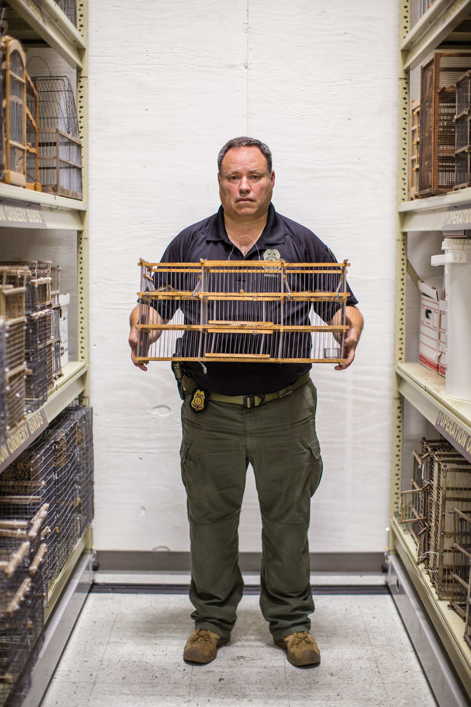 U.S. Fish and Wildlife Service agent David Pharo holds the type of trap often used by traffickers. Karine Aigner