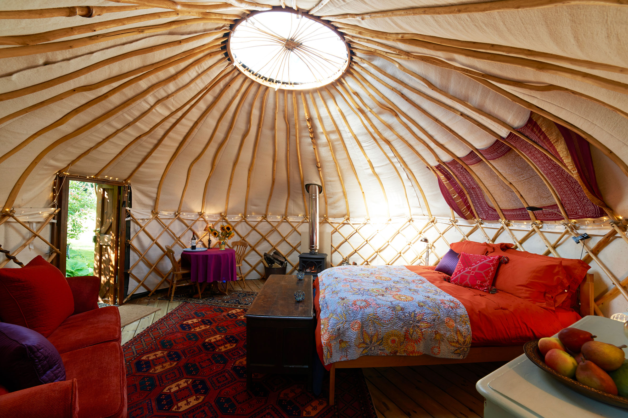 Ooh la la—glamping lets you camp in comfort and wake up with the birds. istock